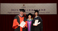 Dr. Clarence Yau (left) and Ms. Yumi Iida (right) receive the Teaching Award 2013